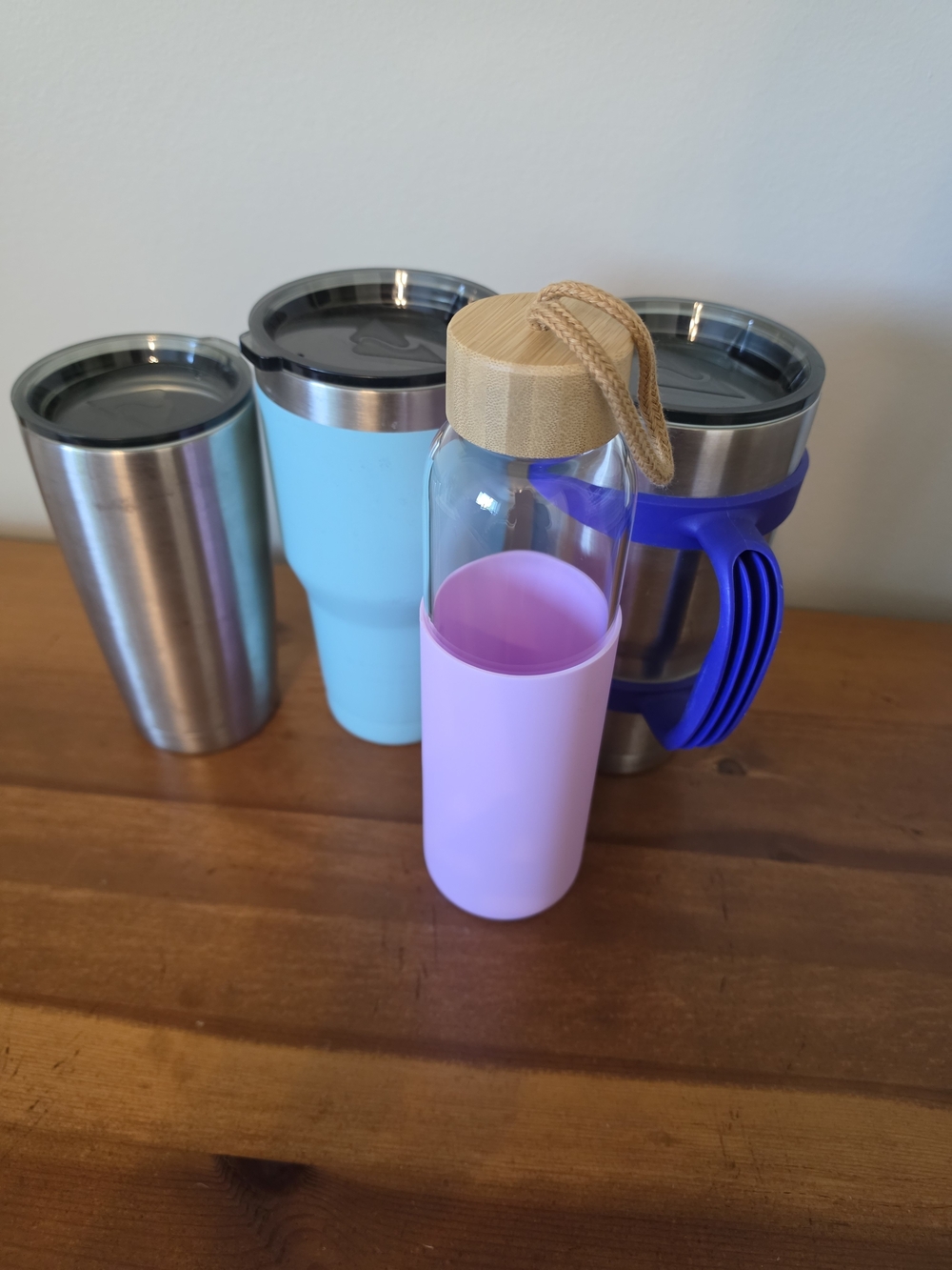Ozark Trail Pink Glass Bottle with Bamboo Lid and Silicone Sleeve